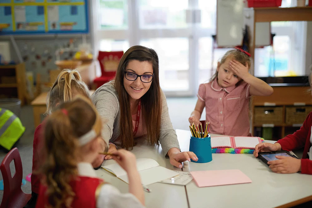 teacher with her students
